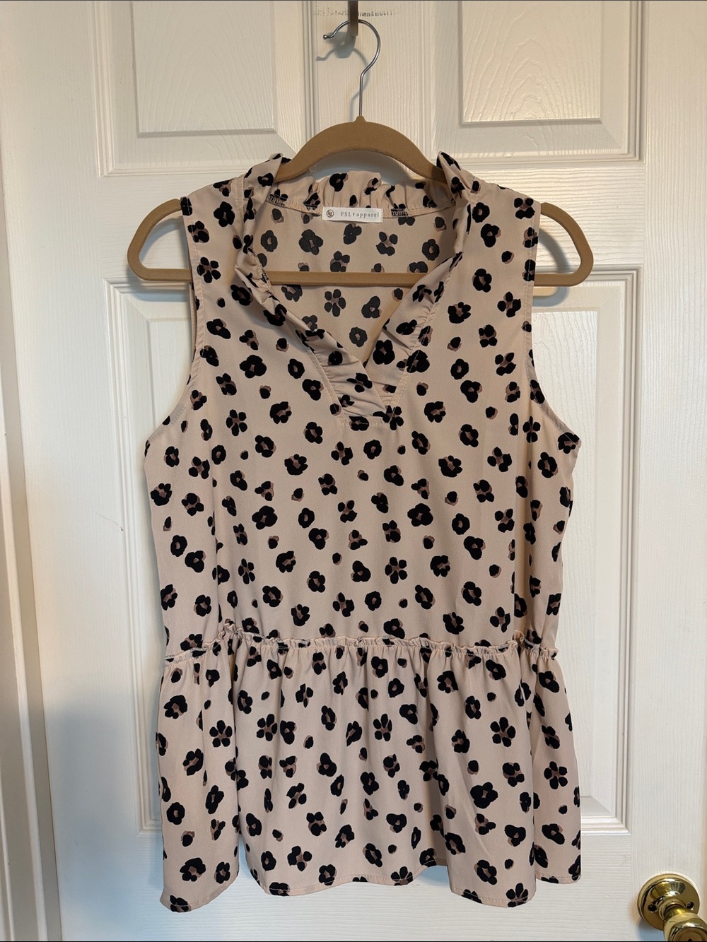 Sleeveless Pink Floral Peplum Blouse
